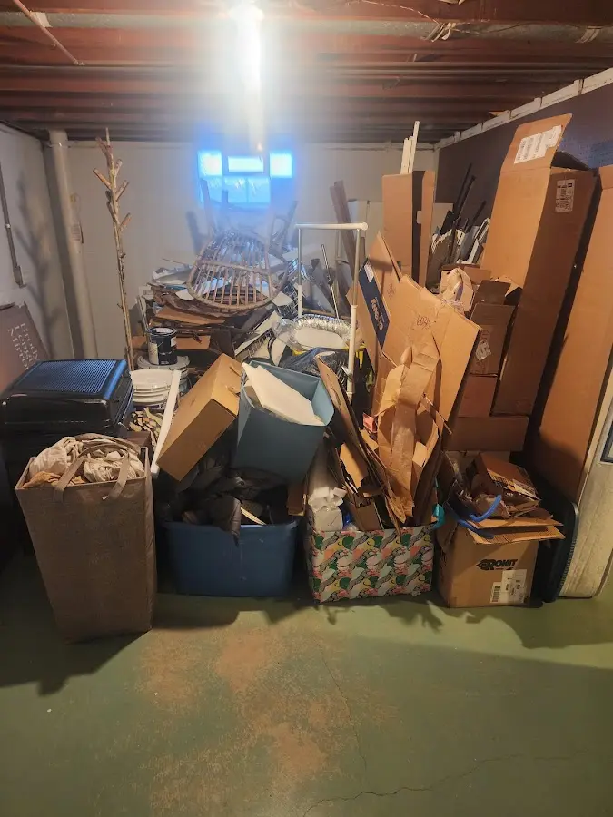 Roll-off dumpster container at job site for 20 Yard Dumpster Rental in Ossian